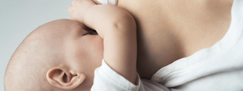 Mother breastfeeding baby