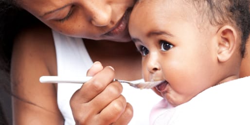 Mother feeding baby