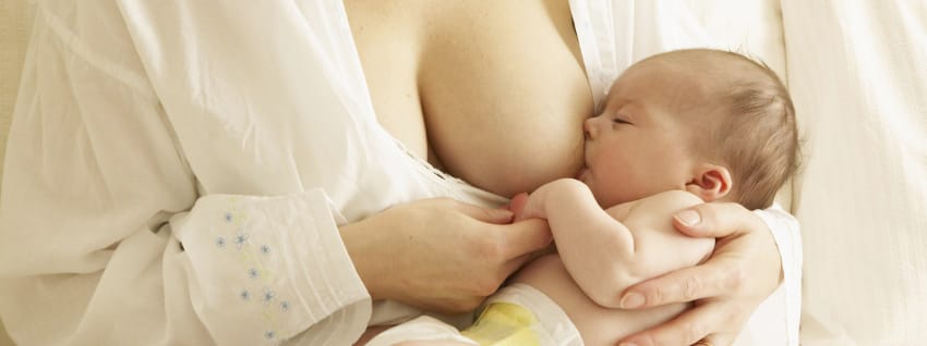 Mother breastfeeding baby