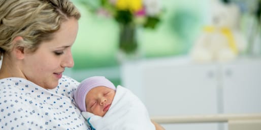 mother-holding-newborn