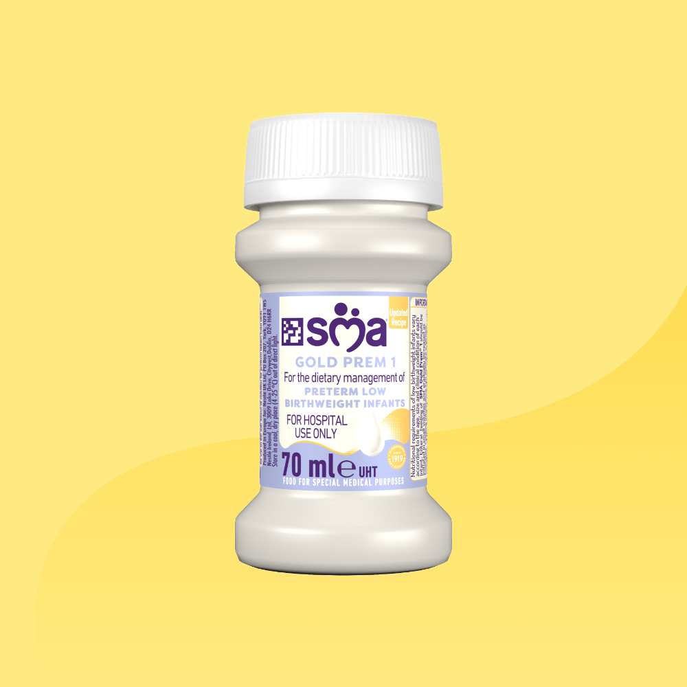Bottle of SMA Gold Prem 1 Formula 70ml in front of a yellow background